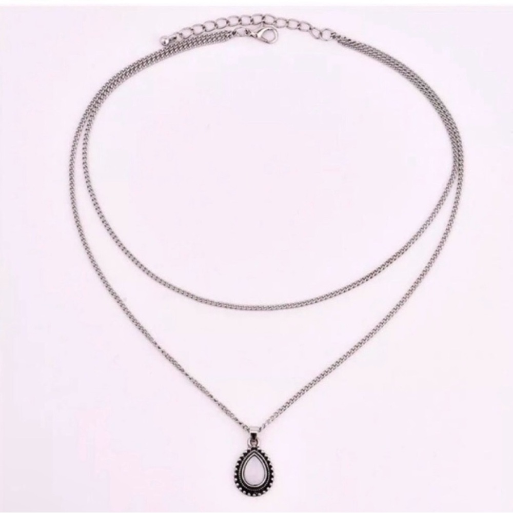 Elegant Silver Pendant Necklace - Picture 2 of 3
